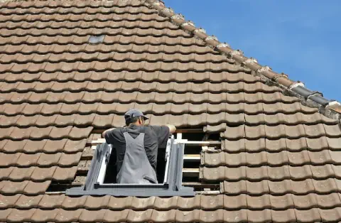 Pose de velux à la Devise